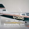 Model of Piper PA-28 Cherokee UND with detailed craftsmanship.